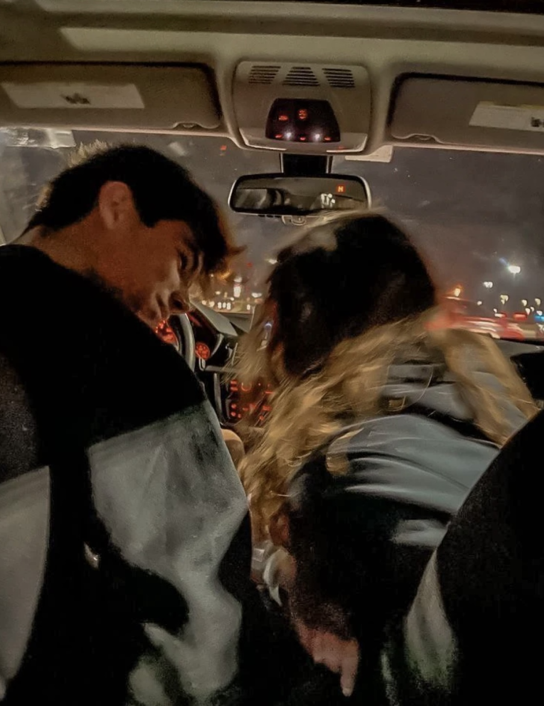 Laughing together on a late drive